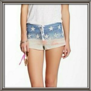 Miss Me drawstring flag shorts.